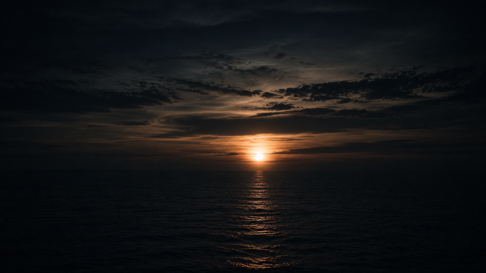 Sunset glow over a calm ocean